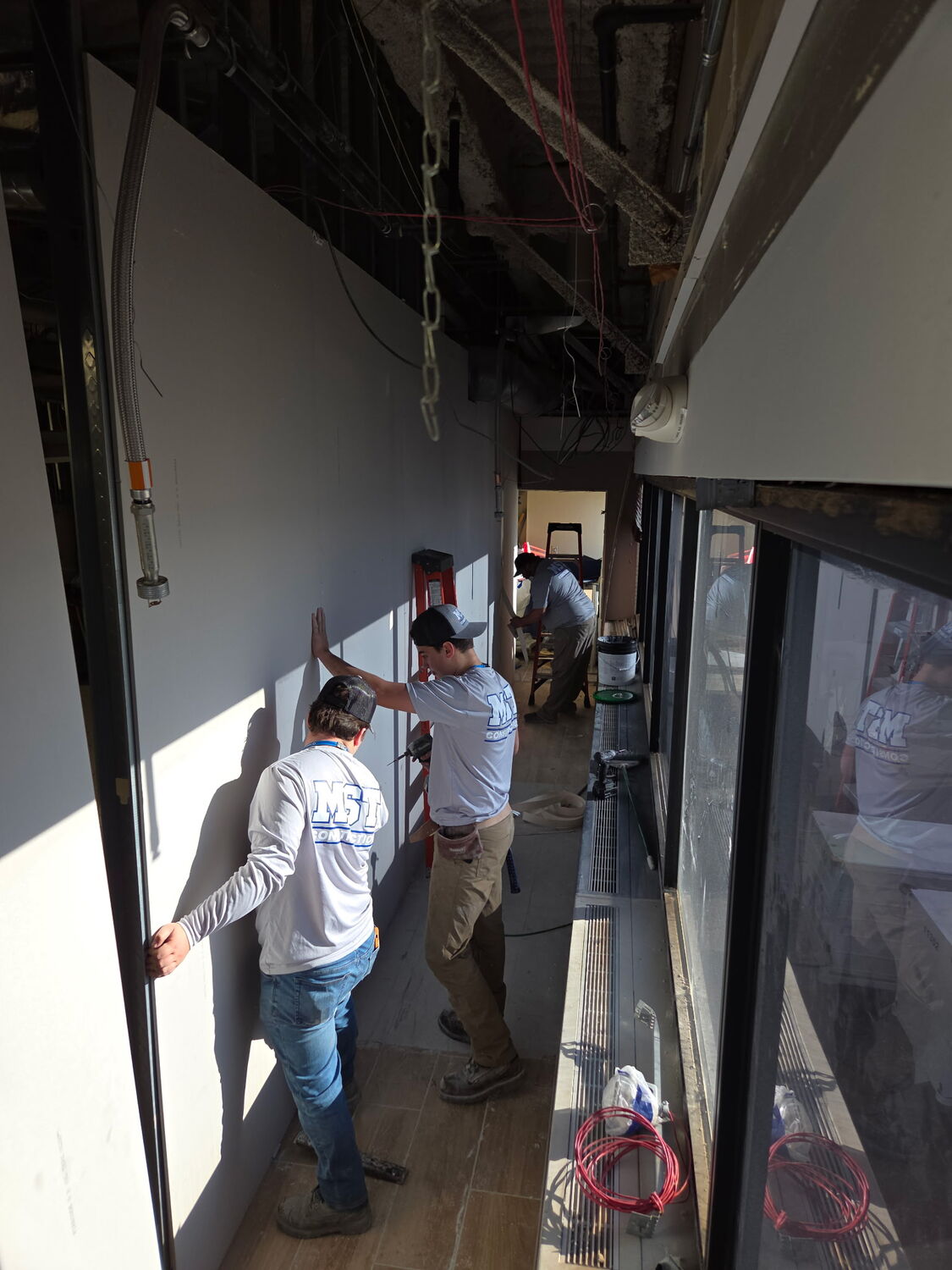 Drywall — Hanging and finishing a commercial build-out by MST Construction