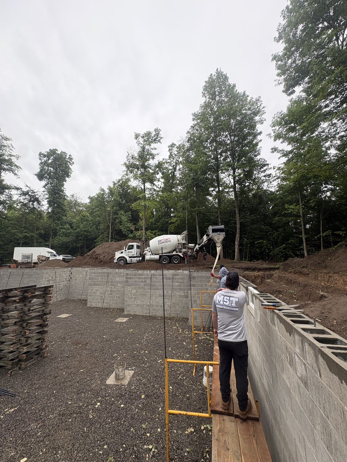 Foundations — Block foundation wall, poured and filled by MST Construction
