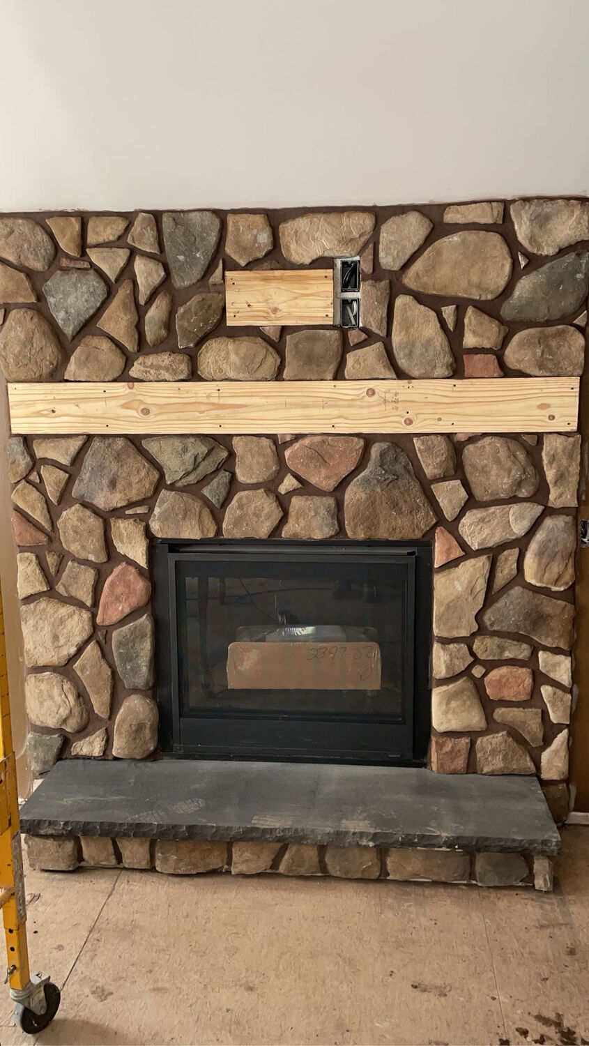 Stonework — Fieldstone fireplace with bluestone hearth by MST Construction